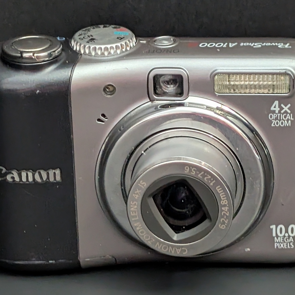 Canon PowerShot A1000 IS PC1309 10 MP optical zoom camera FOR PARTS ONLY 22026D4